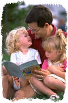 Father reading to daughters. Photo copyrighted. All rights reserved. Licensed: H